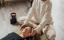Woman in Black Sweater Lying on Floor